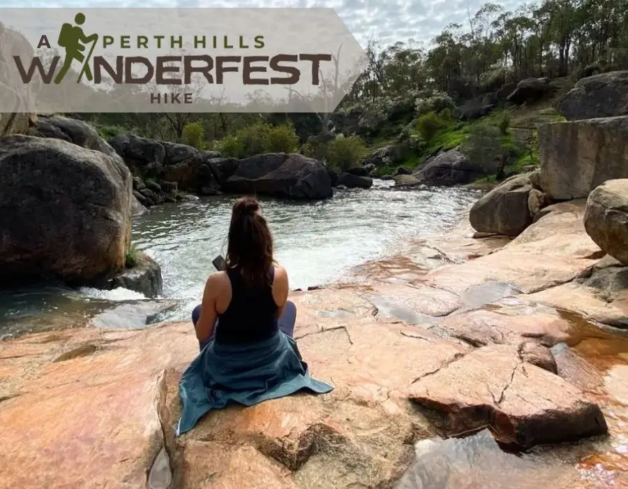 Lady sitting on rock